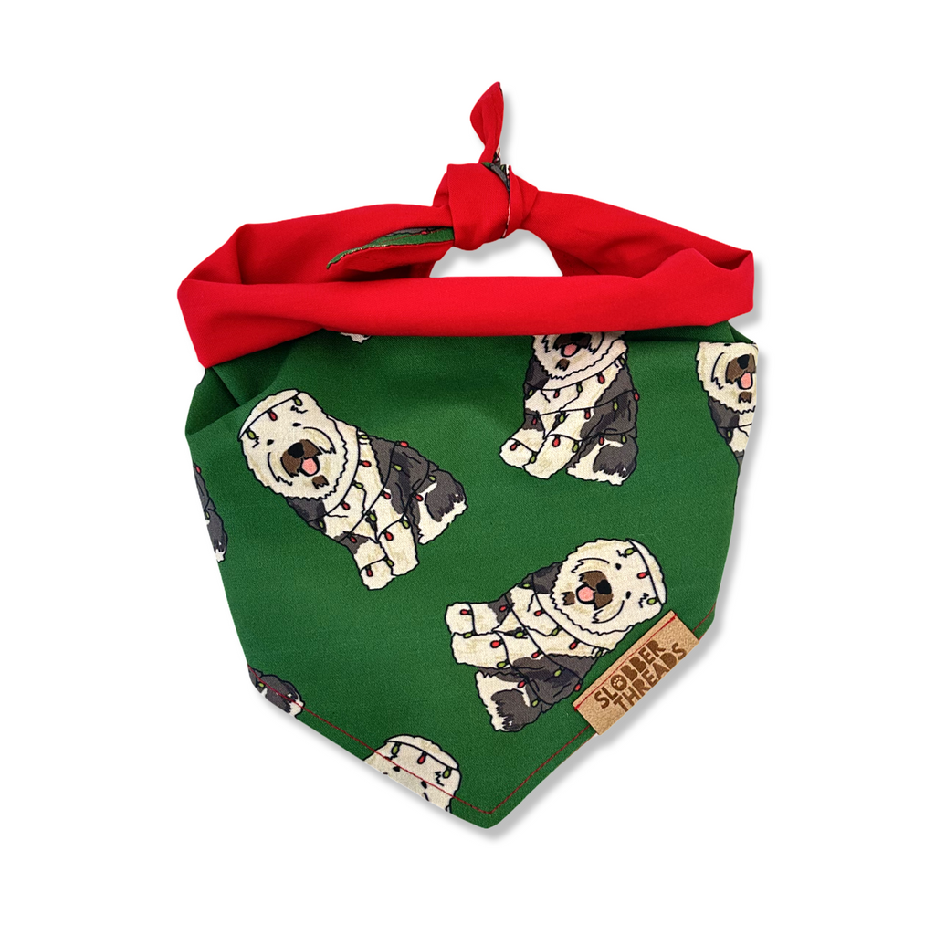 bandanad showing a dog print on a green background 