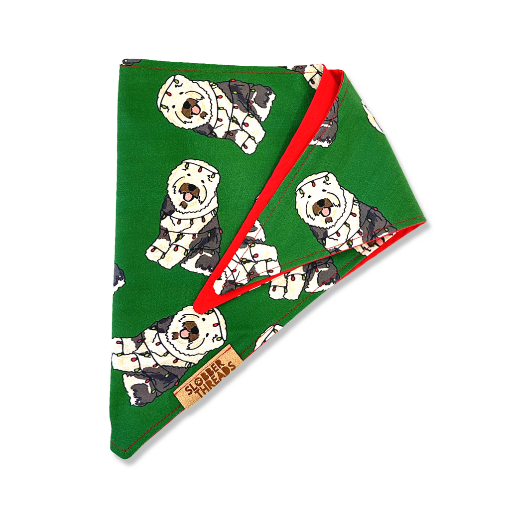 bandanad showing a dog print on a green background 